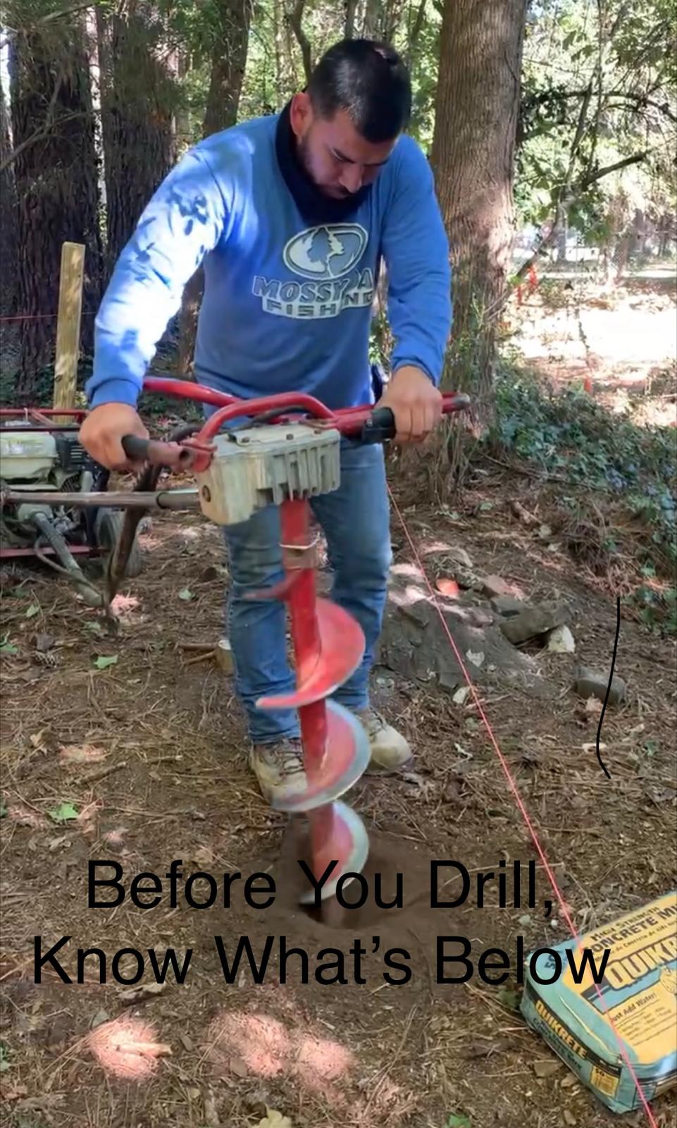 power earth auger contractor drilling a post hole after utility locating and utility marking activities